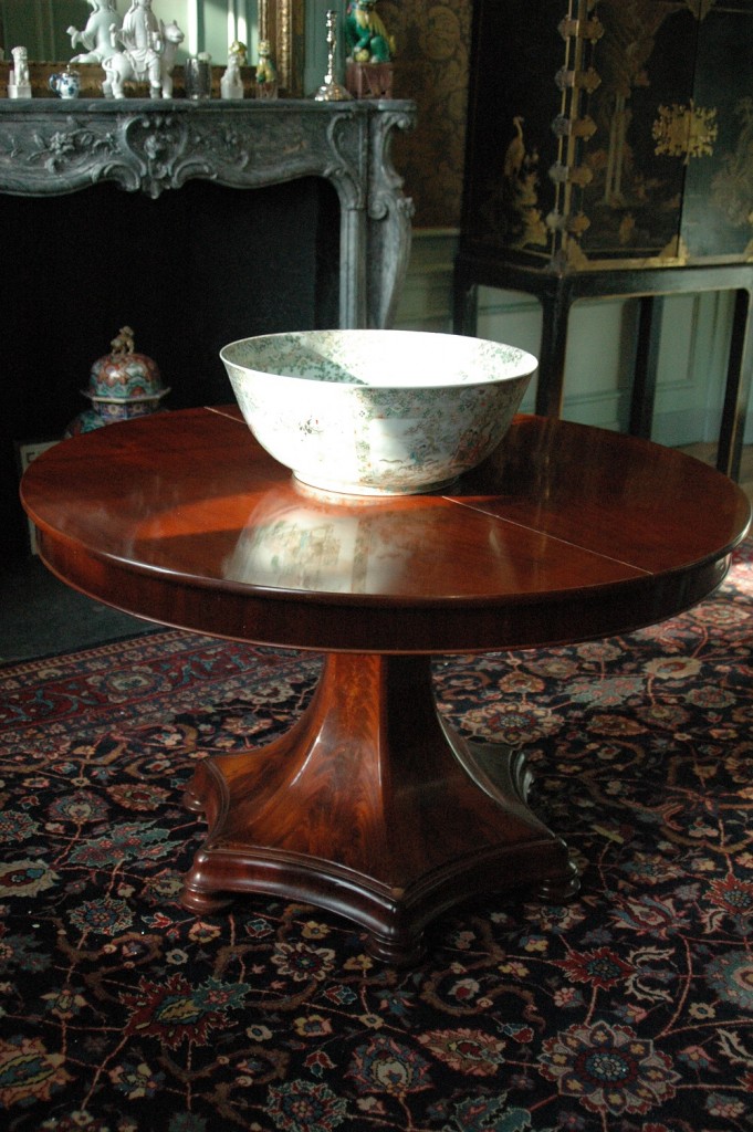 Dutch oval extending dining table, mahogany, with 6 sided veil base. Circa 1840.